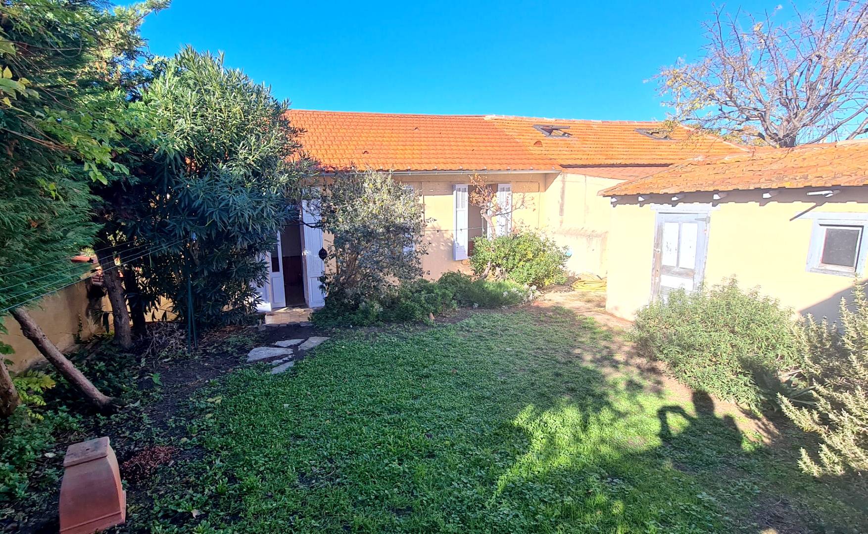 Maison de plain-pied avec jardin privatif à vendre quartier de l'Evescat